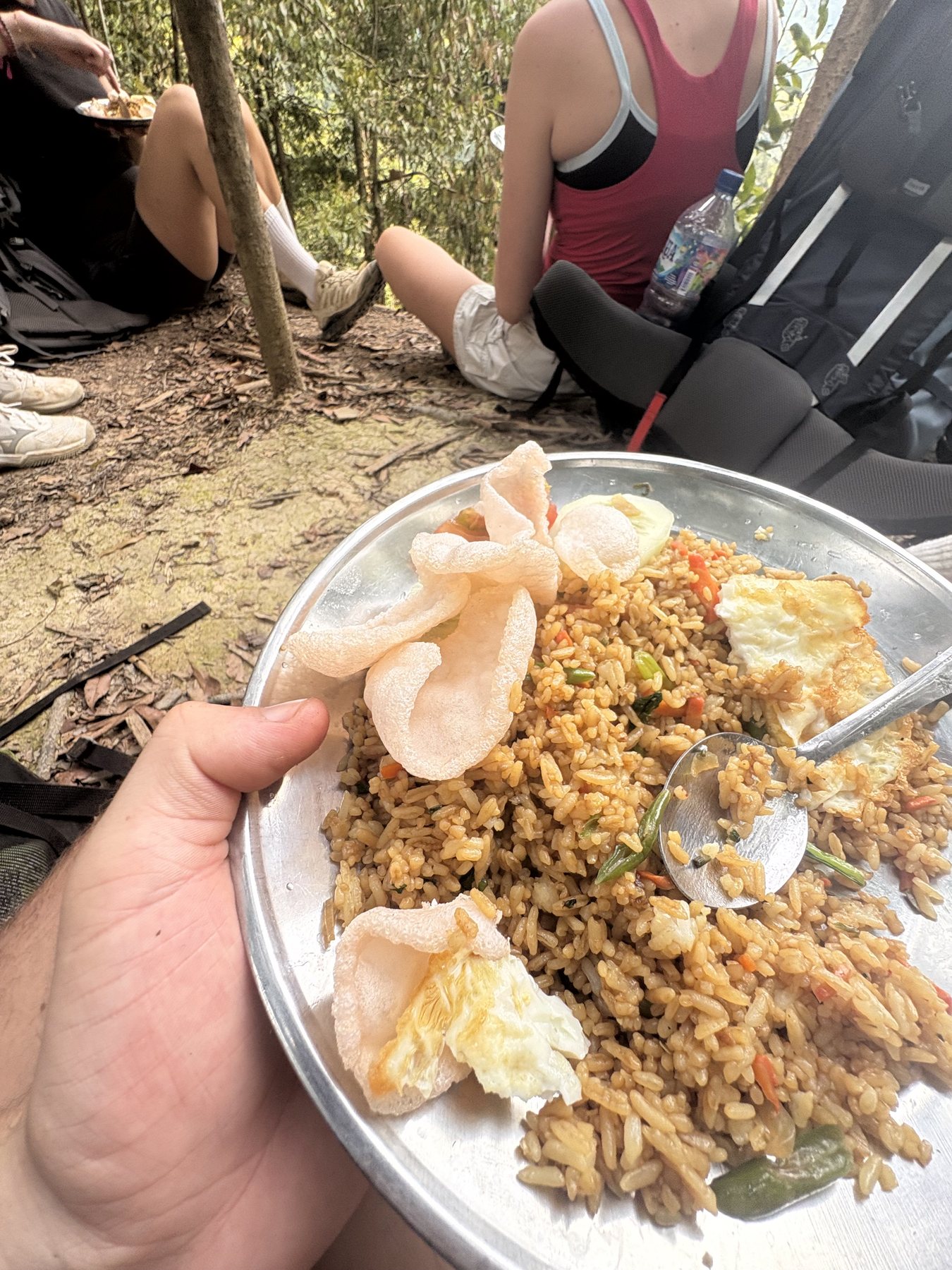 Rice, egg and crackers served during a jungle trek